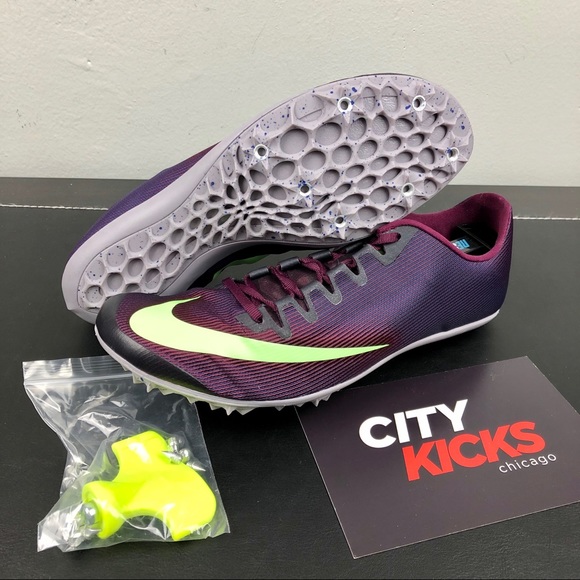 purple nike spikes